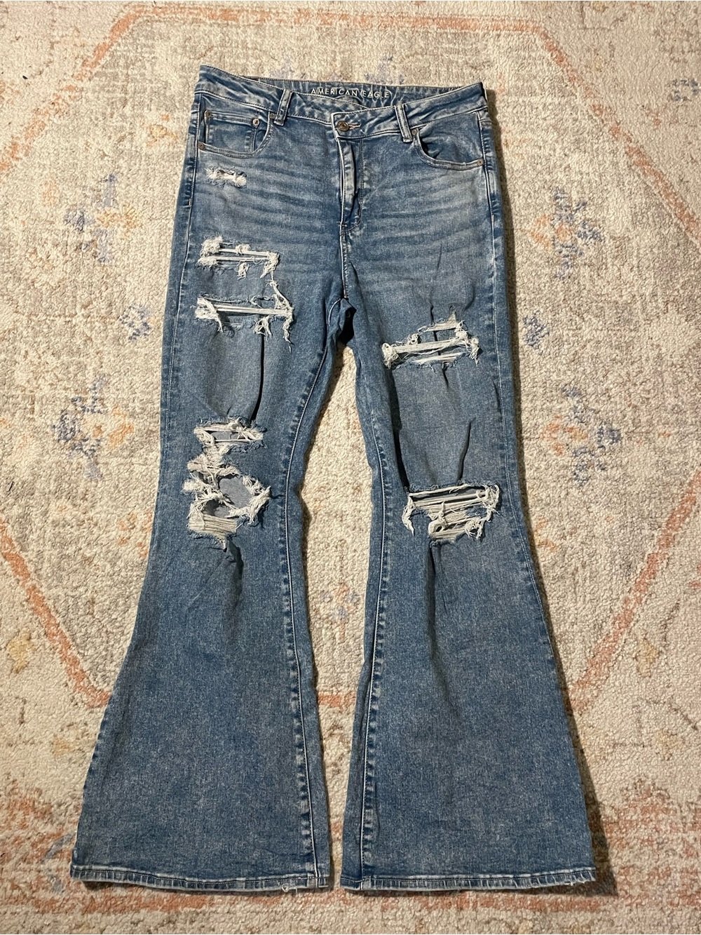 American Eagle Outfitters Next Level Stretch Ripped Flare Jeans